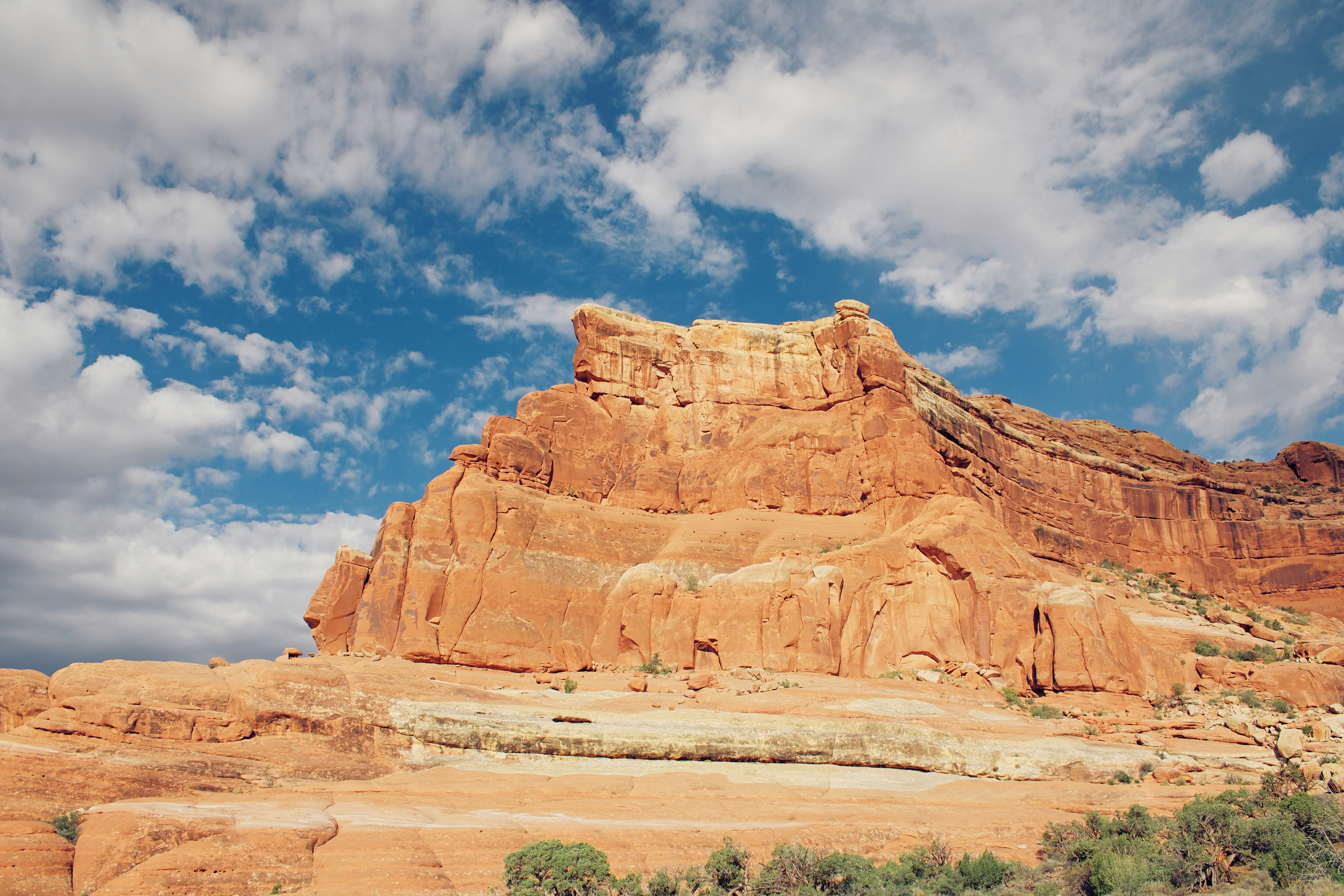 brown rock formation under blue sky during daytime